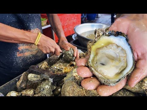 The Oyster king of Thailand, Seafood Mountain in Suratthani-Thailand street food.