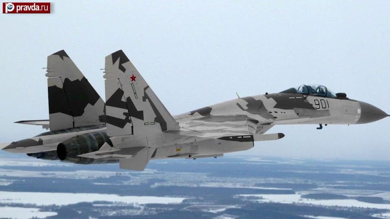 Two Sukhoi Su-35 jets intercept eight F-18 and F-15 fighters