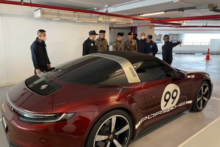 Police seize luxury houses, cars from suspected Chinese gangsters